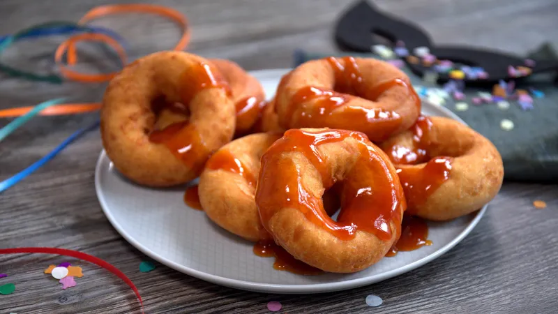 Krafne (donuti) oko malog prsta